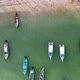 Fishing Boats at Anchor Along a Tropical Coastline Aerial - VideoHive Item for Sale