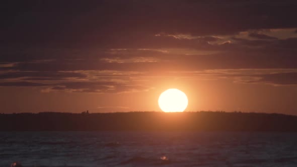 Sunset over coast and sea