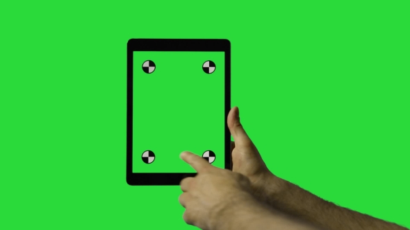  Of Man's Hand Sliding On Tablet Green Screen