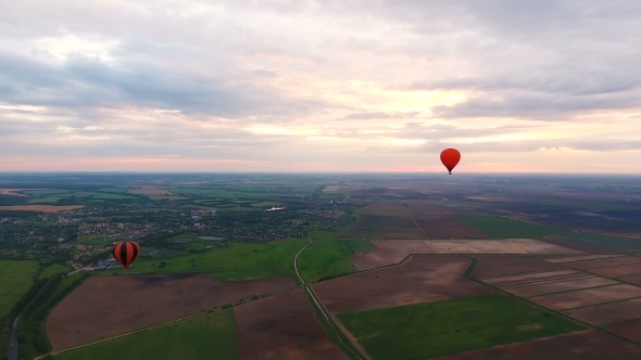 Hot Air Balloons In The Sky Over a field.Aerial View alt