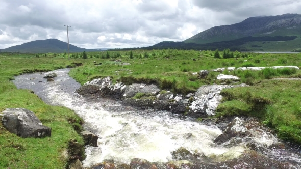 River And Hills At Connemara In Ireland  35