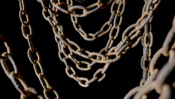 Old Metal Chain with Rusted Links on Black Isolated Studio Background