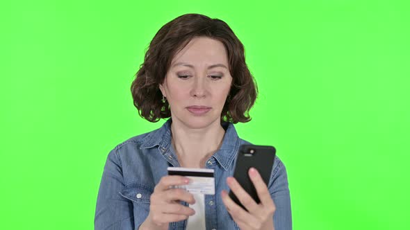 Online Payment on Smartphone By Old Woman, Green Chroma Key Background 