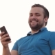 Smiling Bearded Man Using Phone - VideoHive Item for Sale