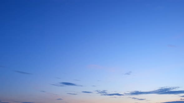 4K UHD : Time lapse of colorful sky during beautiful sunset. Romantic clouds.