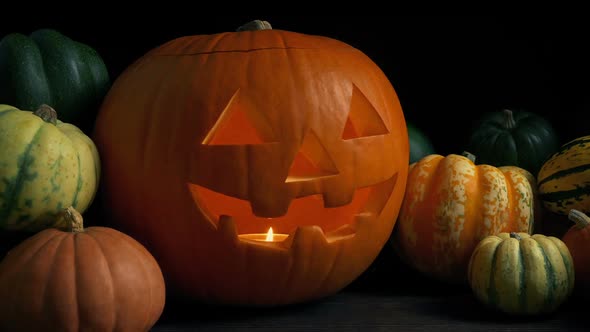 Glowing Halloween Pumpkin On Table