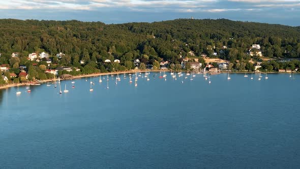 Aerial view flying drone of town Herrsching at Ammersee lake, popular excursion and recreation place