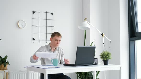 Male Employee Working in the Office