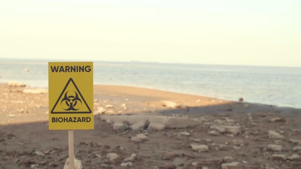 Seashore and Warning Sign