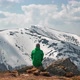 Man Sit on Rock in Spring Mountains - VideoHive Item for Sale