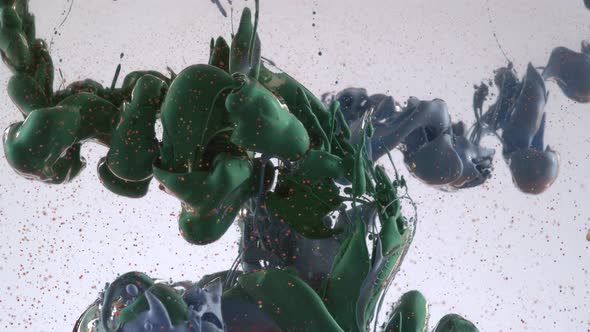 Slow motion shot of ink pouring into oil, shot with Phantom Flex 4K camera. alt