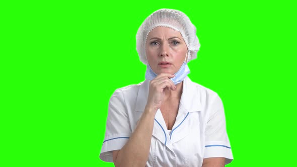Shocked Female Doctor on Green Screen.