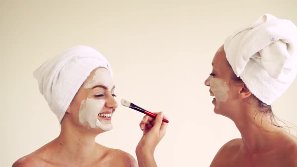 Beautiful Woman Having a Facial Treatment at Spa