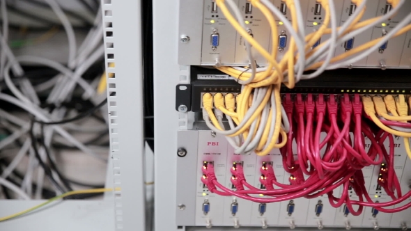  Of Cables And Wiring Links Servers In a Huge Data Center. Slider Shoot.