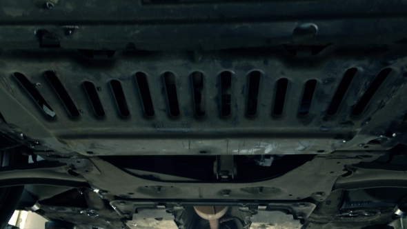 Bottom Of The Car And Exhaust Pipe Car Maintenance At Service Station alt