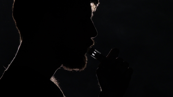 Bearded Overweight Man Using E-cigar And Coughing. Black. Silhouette. 