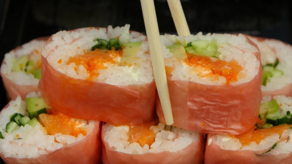 Chef Puts Sushi In Pink Norrie In a Bowl. 