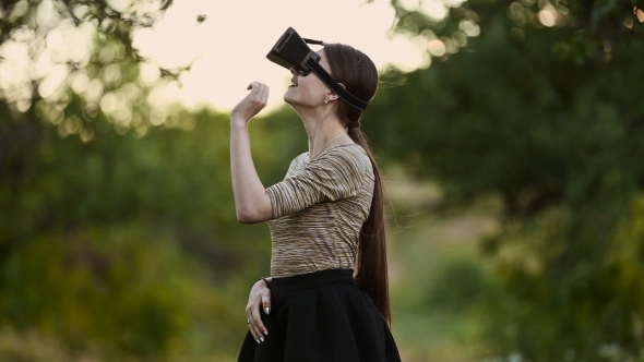 Woman With Glasses Of Virtual Reality