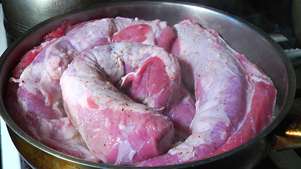 Fry Meat in a Frying Pan