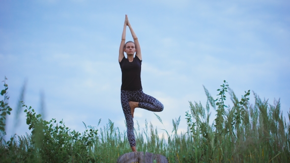 Beautiful Young Healthy Woman Doing Yoga Exercise