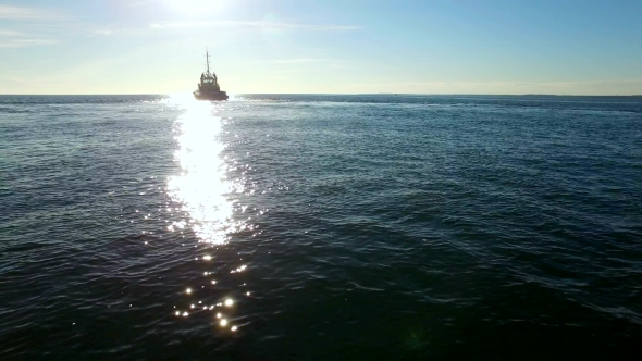 Aerial Shot Of a Tugboat In Sea