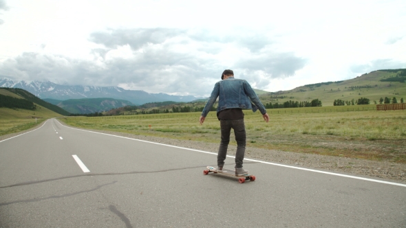 Hipster Man Longboarding Extremely Action In Highway.