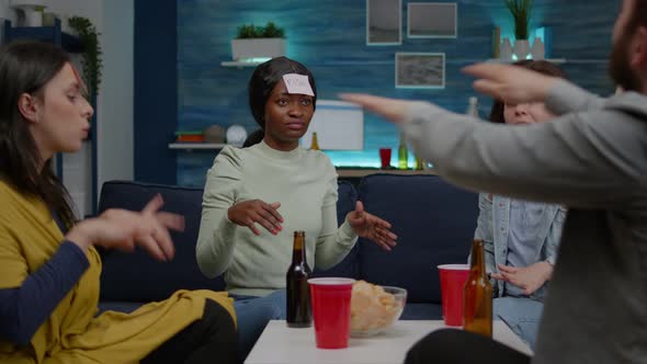 Afro American Woman Having Attaching Sticky Notes on Forehead