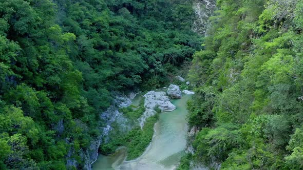 Aerial view deep gorges of creek at Muchas Aguas. Dominican Republic