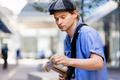 Young musician with guitar in city - PhotoDune Item for Sale