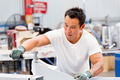 Asian worker in production plant on the factory floor - PhotoDune Item for Sale