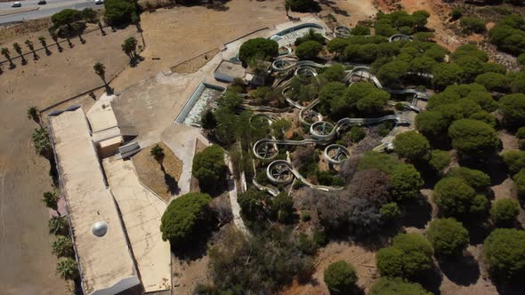 Aerial View Of Abandoned Slides And Swimming Pools At Aqualine Water Park In Algarve, Portugal.