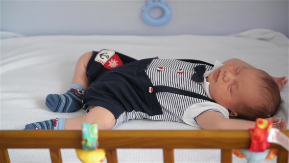 New Born Child In Wooden Co-sleeper Crib, Infant Sleeping