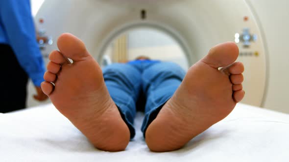 A patient is loaded into an mri machine