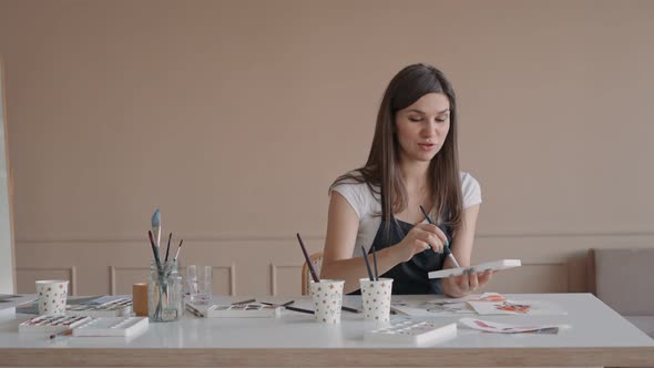 Beautiful Female Artist In Her Studio