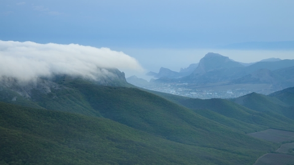 Fog Is Moving On The Mountain Slopes