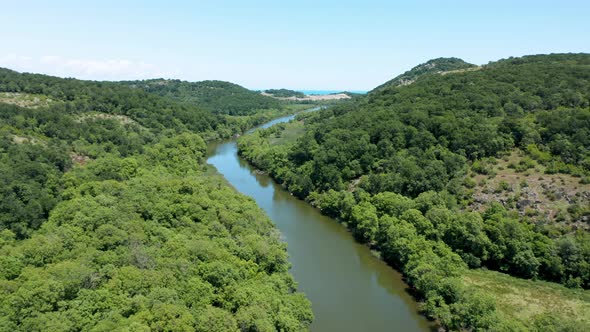 Drone flight above a picturesque river valley