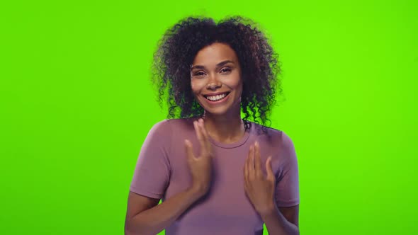 Dark Skinned Woman with Glad Expression, Blinks an Eye, Flirts with Boyfriend