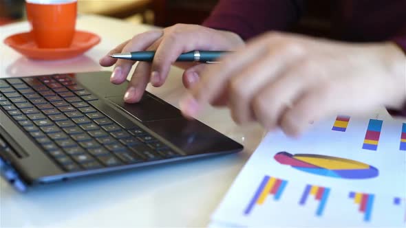 Hands Typing On Keyboard