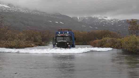 Truck Rides on River