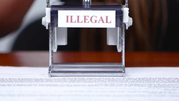 Financial Worker Puts a Stamp On The Illegality Of The Document. 