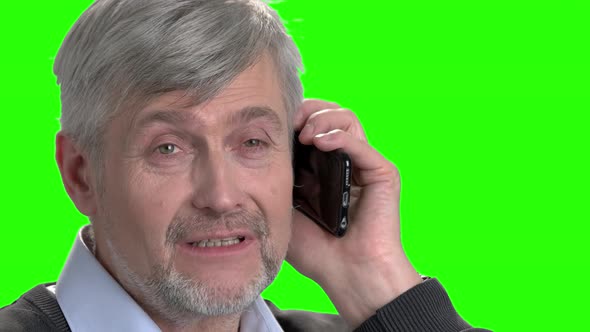 Mature Caucasian Man Talking on Phone.