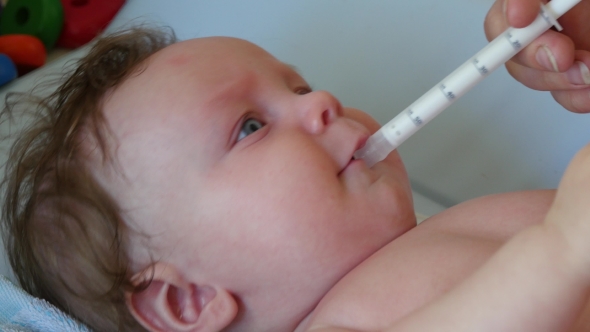 Baby Feeding With Liquid Medicine