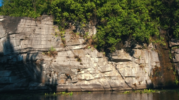 Raft Sailing In Canyon