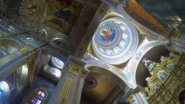 Russian Church Candles And Icon Behind