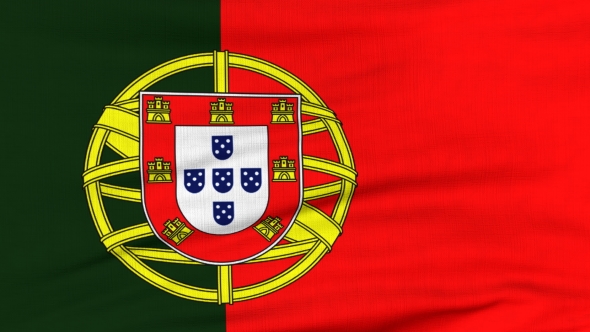 National Flag Of Portugal Flying On The Wind