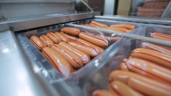 Packaging Sausage On Production