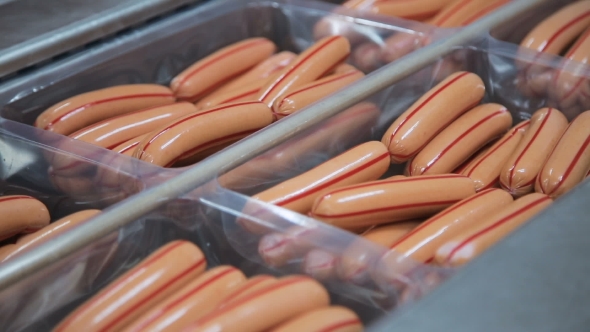 Packaging Sausage On Production