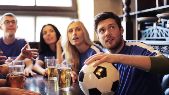 Soccer Fans Watching Football Match At Bar Or Pub 29