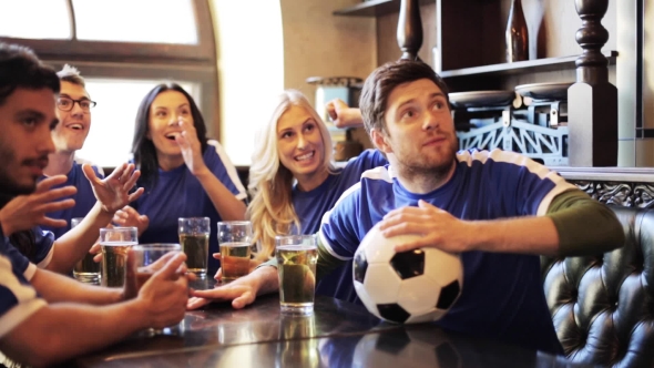 Soccer Fans Watching Football Match At Bar Or Pub 30
