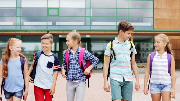 Group Of Happy Elementary School Students Walking 1